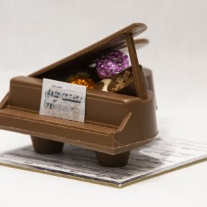 Milk Chocolate Piano filled with assorted truffles and chocolates