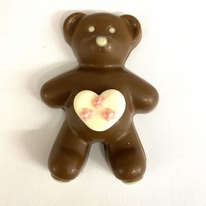 Handmade milk chocolate Teddy Bear filled with rice crispies and a sugar heart motif belly