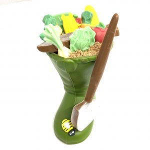 Handmade Milk Chocolate gardening boot with white and milk chocolate vegetables and gardening tools